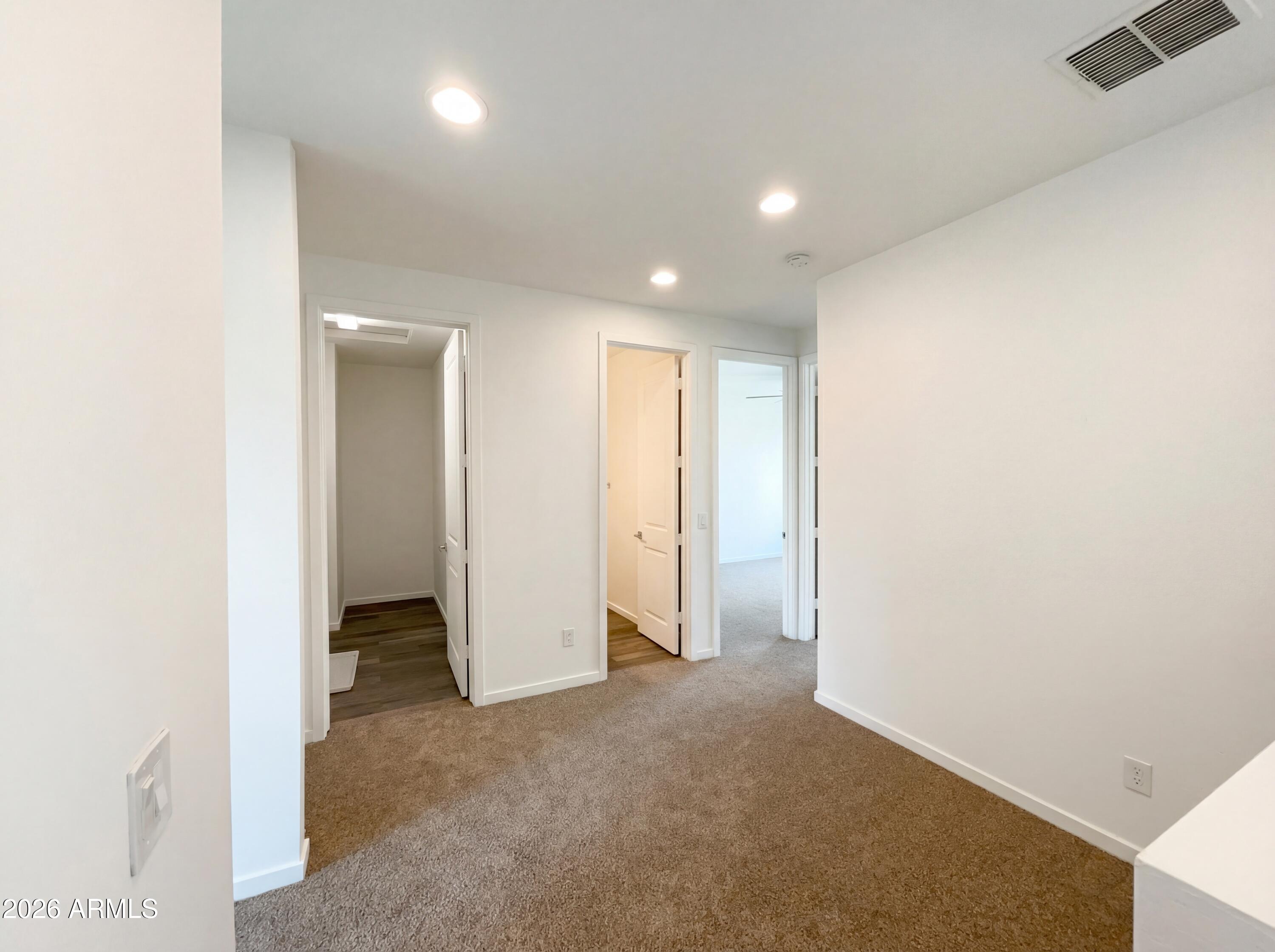 901 South Smith Road, Unit 1074 Tempe, AZ 85281 - Photo 13 of 23 an empty room with closet and a bathroom