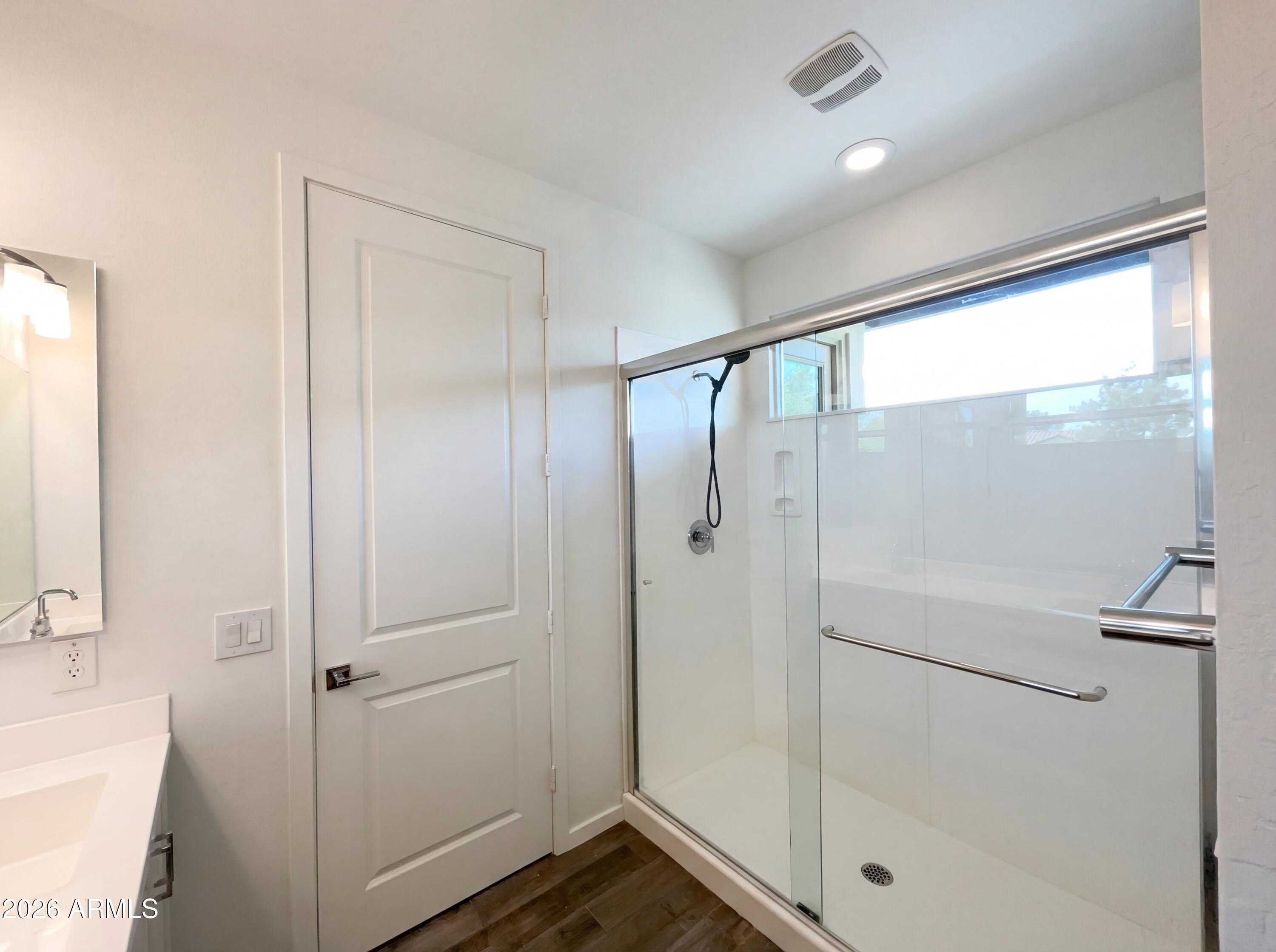 901 South Smith Road, Unit 1074 Tempe, AZ 85281 - Photo 21 of 23 a bathroom with a glass shower door