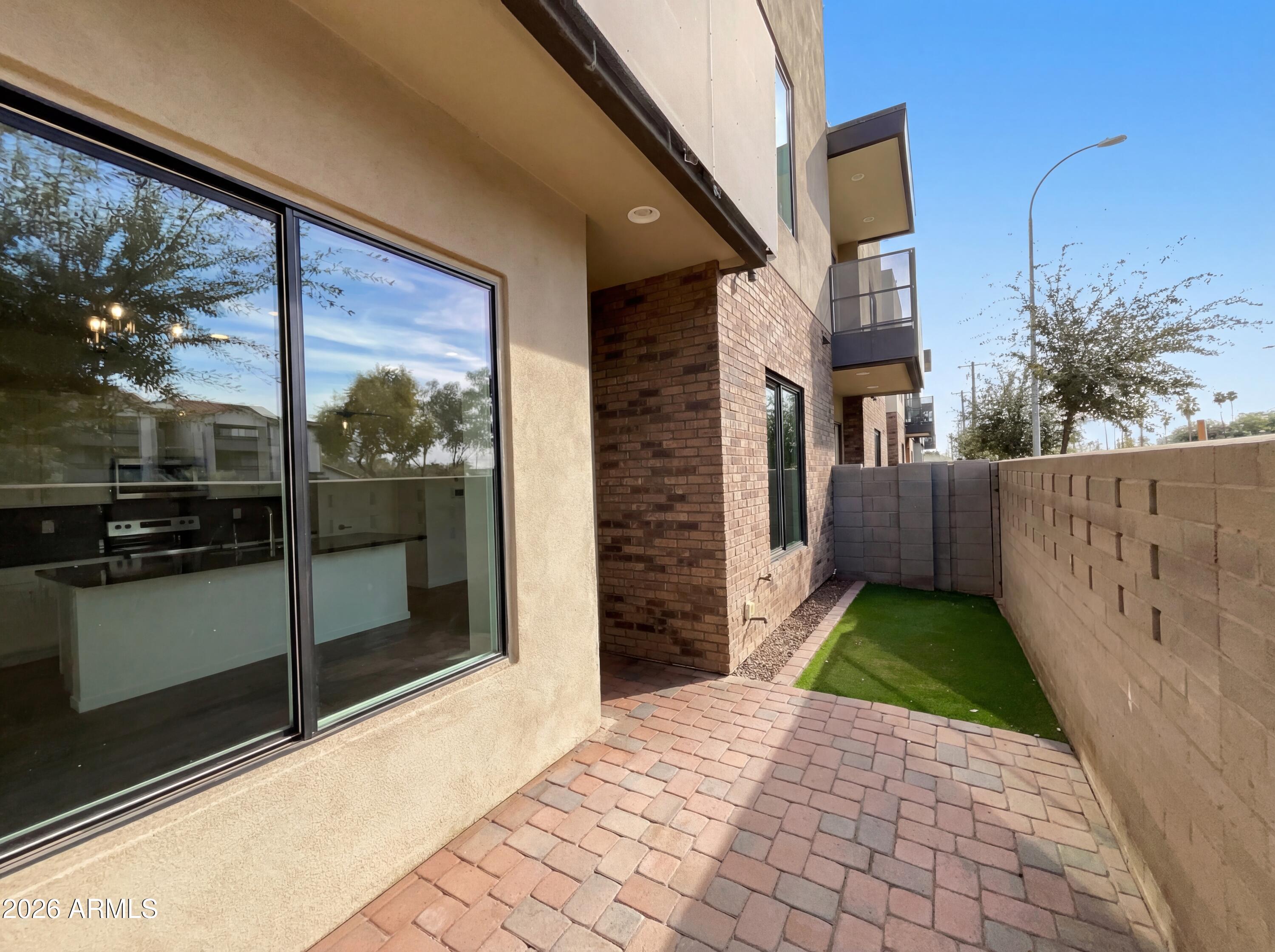 901 South Smith Road, Unit 1074 Tempe, AZ 85281 - Photo 5 of 23 a view of a garden from a building