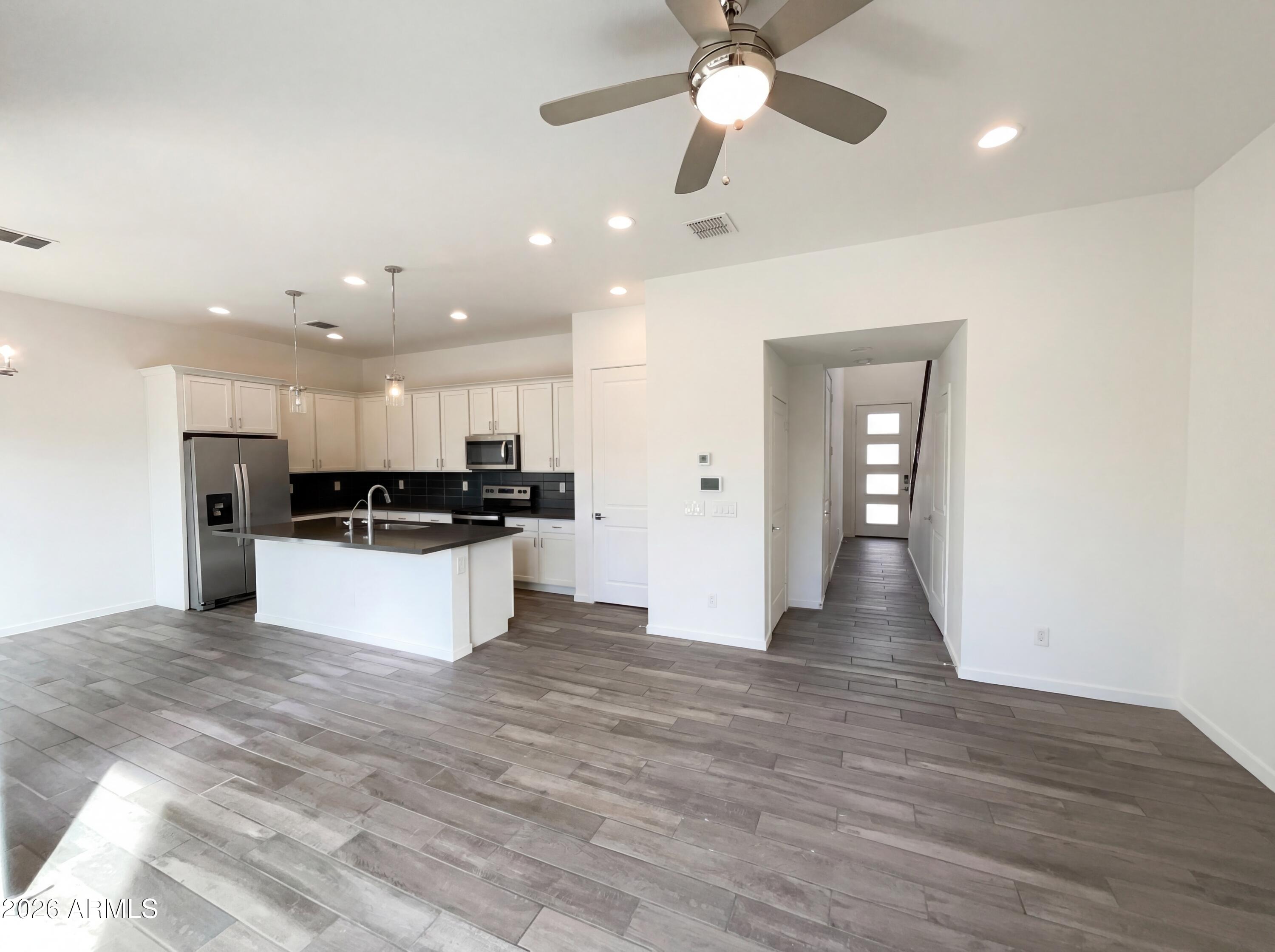 901 South Smith Road, Unit 1074 Tempe, AZ 85281 - Photo 9 of 23 a view of kitchen with refrigerator and microwave