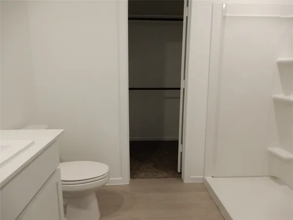 a bathroom with a sink and mirror