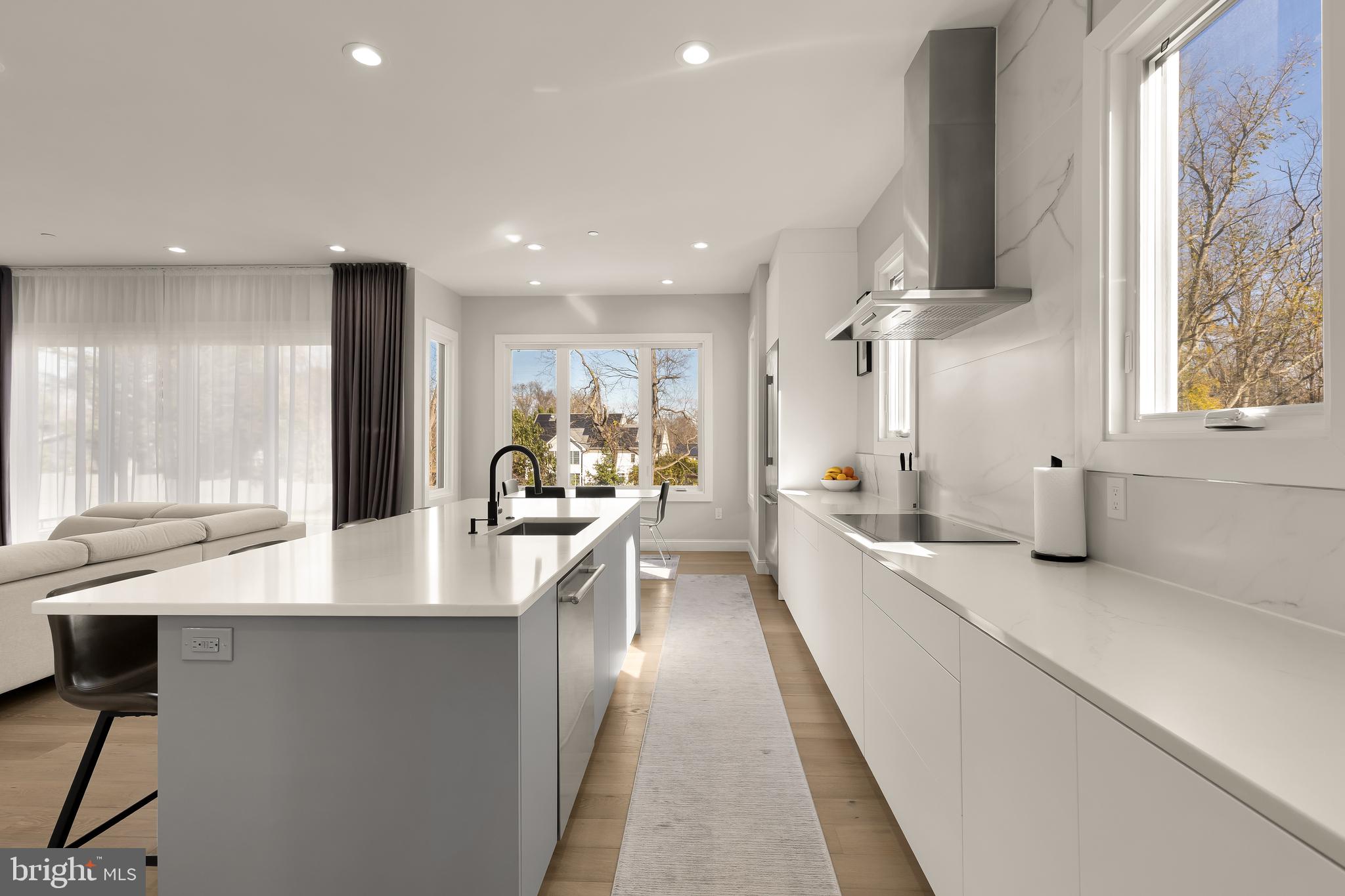 14051 Esworthy Road Darnestown, MD 20874 - Photo 11 of 50 a large white kitchen with a large window