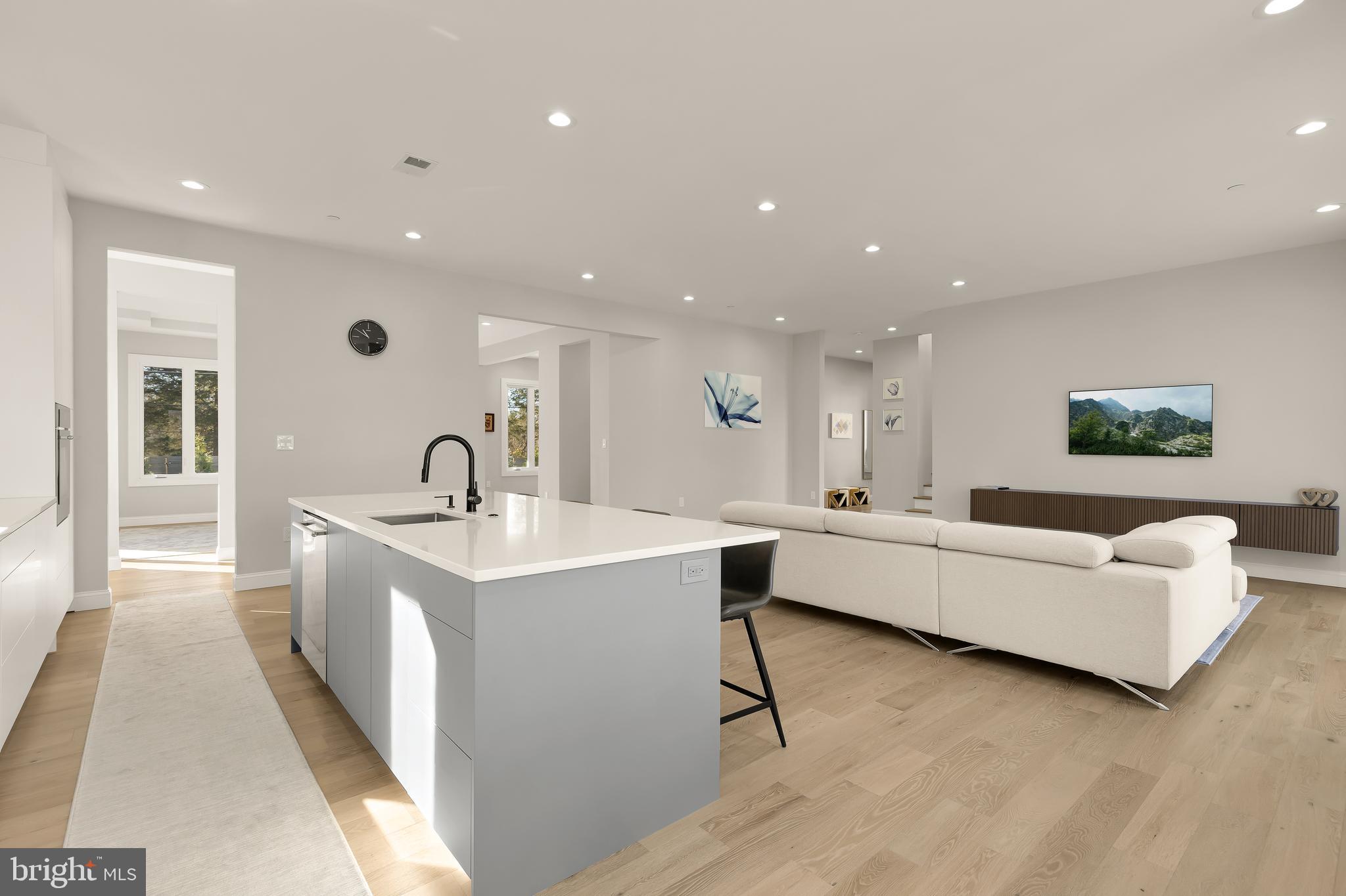 14051 Esworthy Road Darnestown, MD 20874 - Photo 13 of 50 a living room with furniture and a table