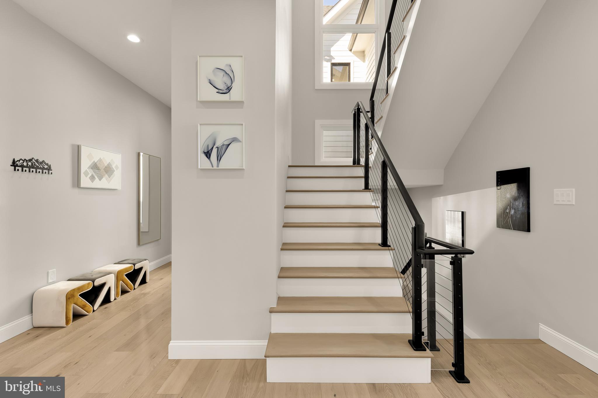 14051 Esworthy Road Darnestown, MD 20874 - Photo 15 of 50 a view of entryway and hall with wooden floor