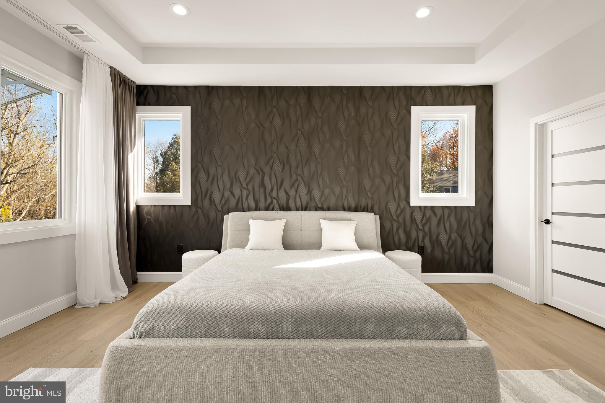 14051 Esworthy Road Darnestown, MD 20874 - Photo 18 of 50 a bedroom with a large bed and a window