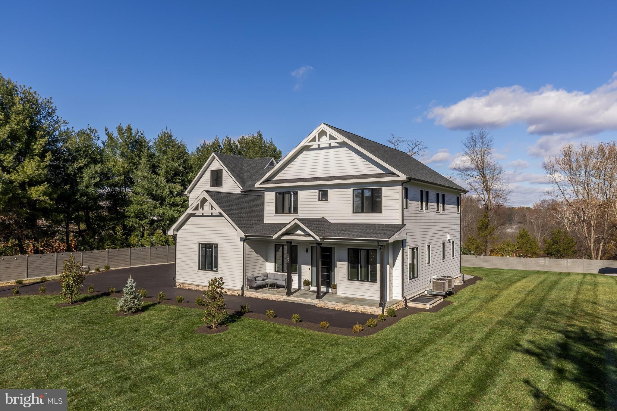 14051 Esworthy Road Darnestown, MD 20874 - Photo 3 of 50 a view of house with backyard