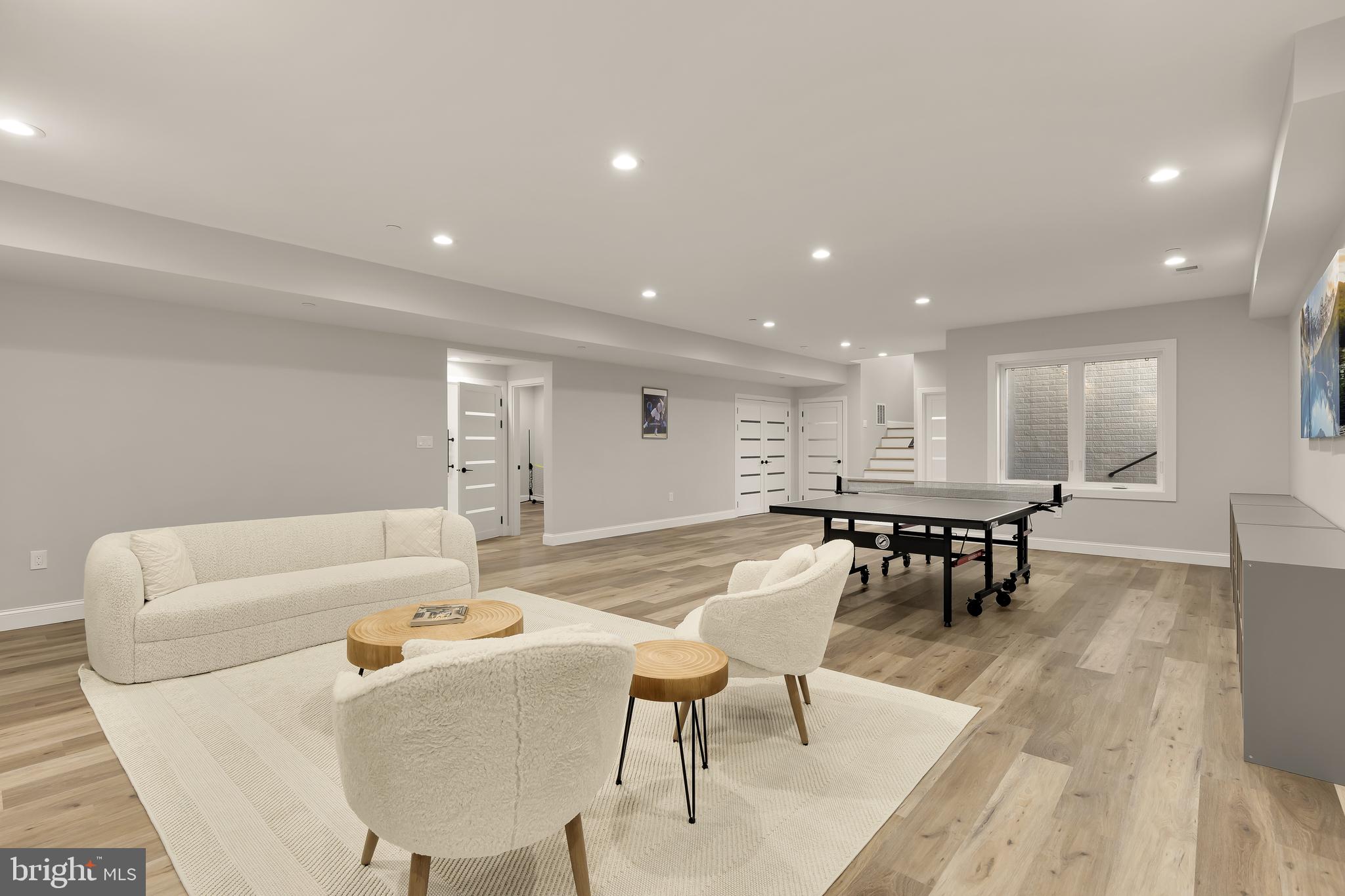 14051 Esworthy Road Darnestown, MD 20874 - Photo 33 of 50 a living room with furniture and a table