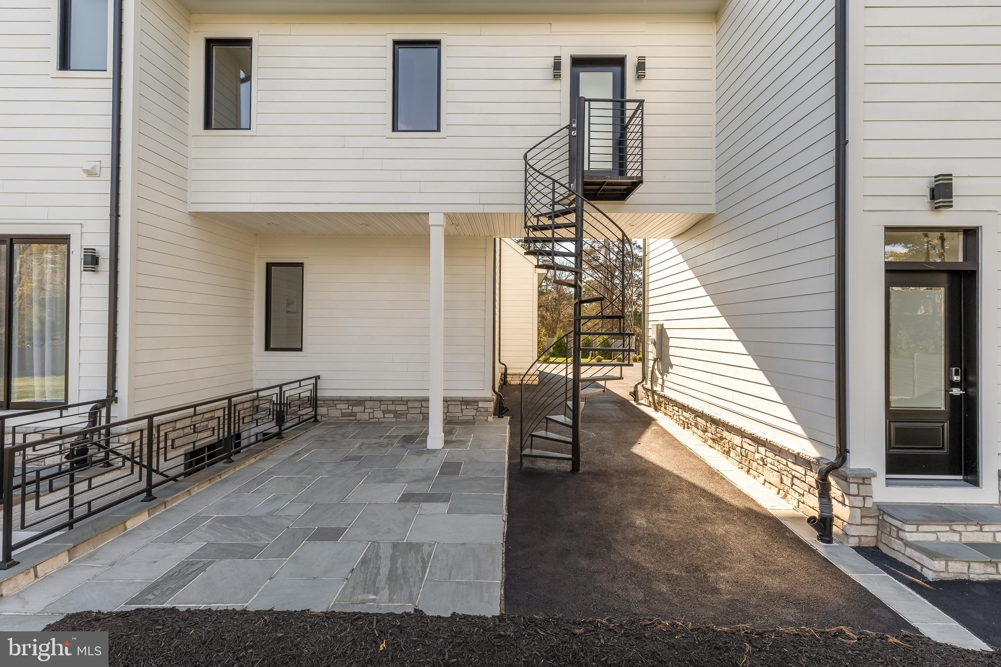 14051 Esworthy Road Darnestown, MD 20874 - Photo 36 of 50 a view of a house with a door and wooden floor