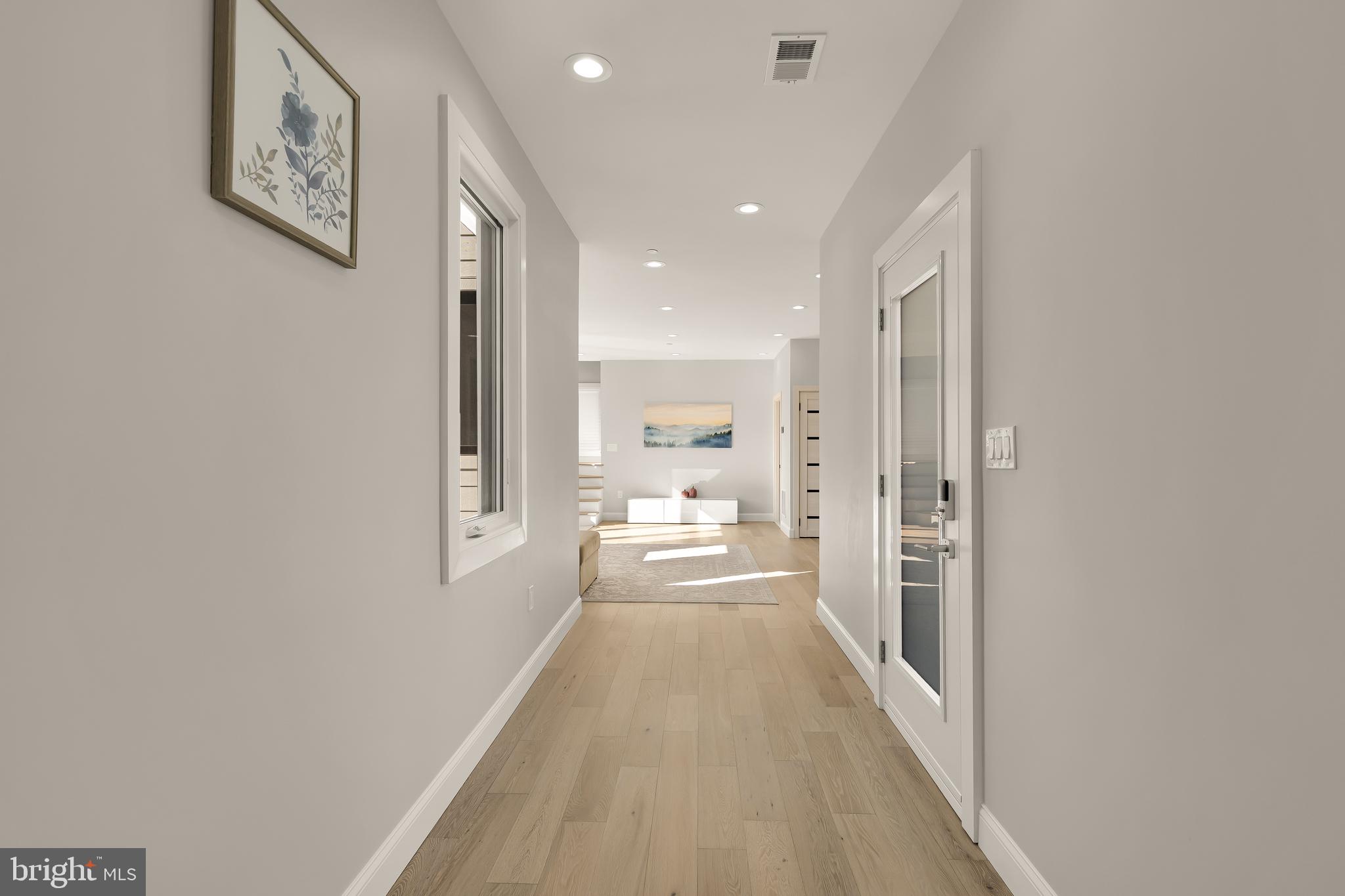 14051 Esworthy Road Darnestown, MD 20874 - Photo 37 of 50 a view of a big room with closet and wooden floor
