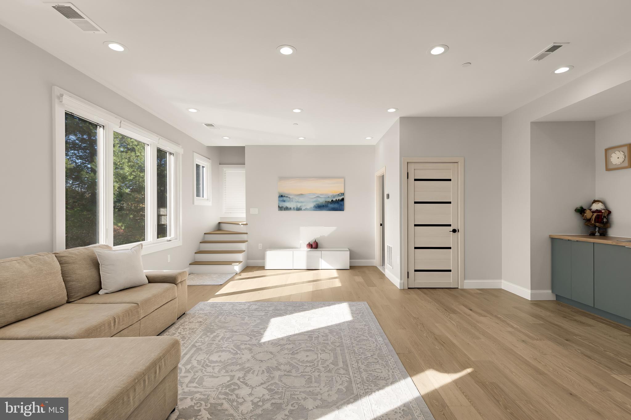 14051 Esworthy Road Darnestown, MD 20874 - Photo 40 of 50 a spacious bedroom with a large bed and a window