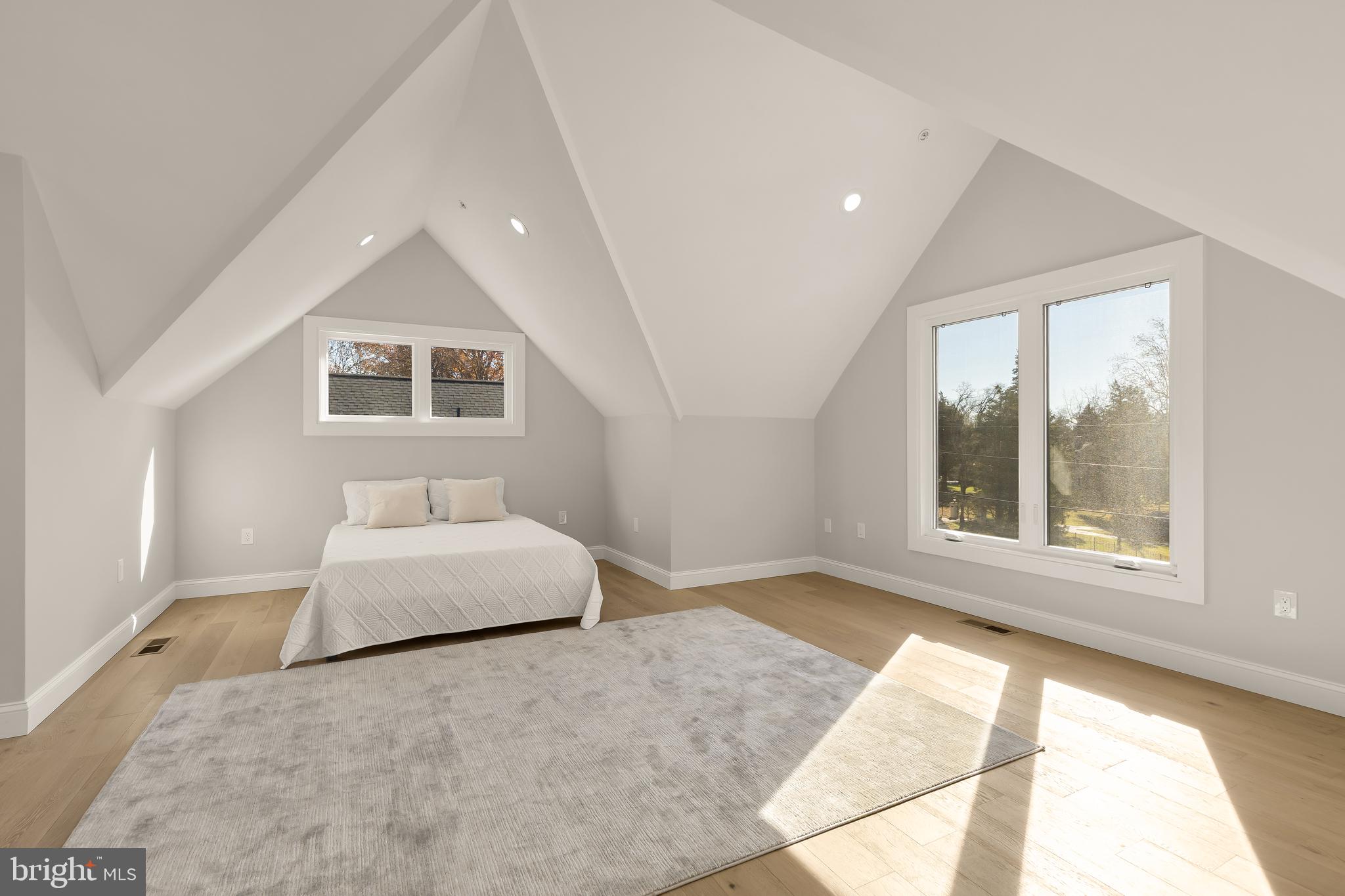 14051 Esworthy Road Darnestown, MD 20874 - Photo 42 of 50 a bedroom with a bed and a large window