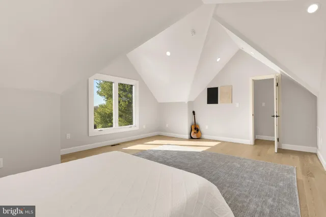 a bathroom with a toilet sink and a mirror