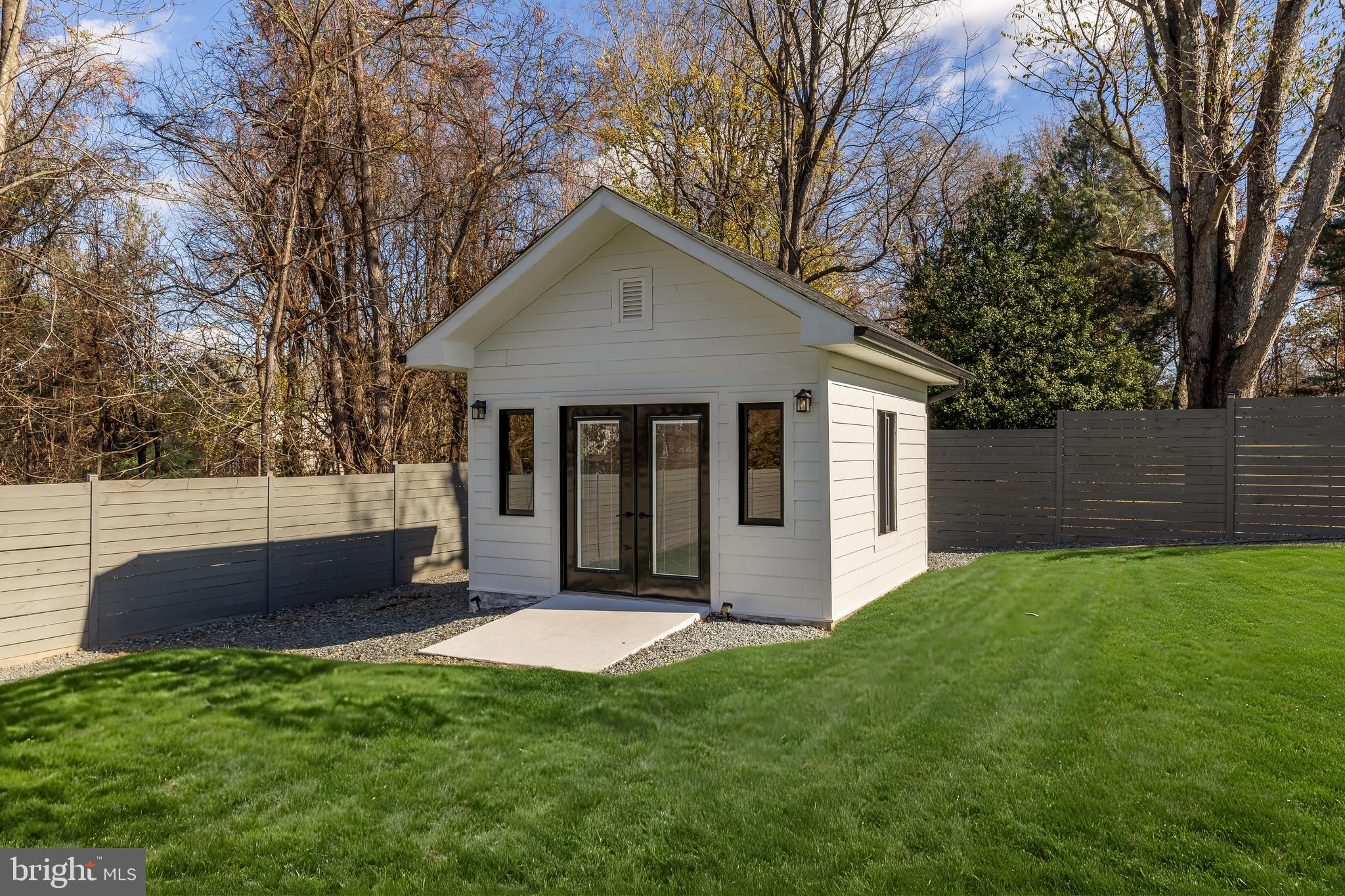 14051 Esworthy Road Darnestown, MD 20874 - Photo 50 of 50 a view of a house with yard and tree s