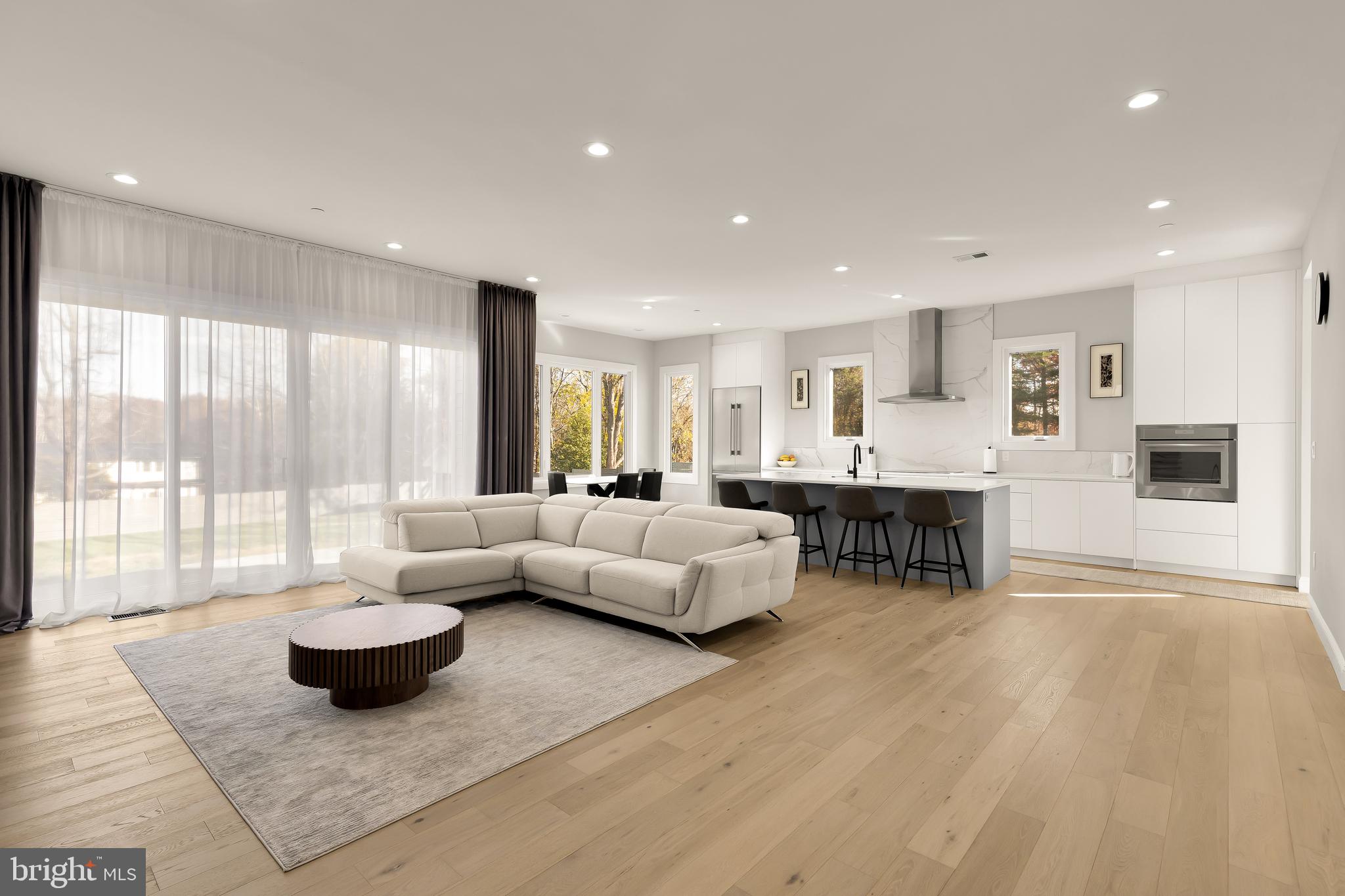 14051 Esworthy Road Darnestown, MD 20874 - Photo 7 of 50 a living room with furniture and a large window