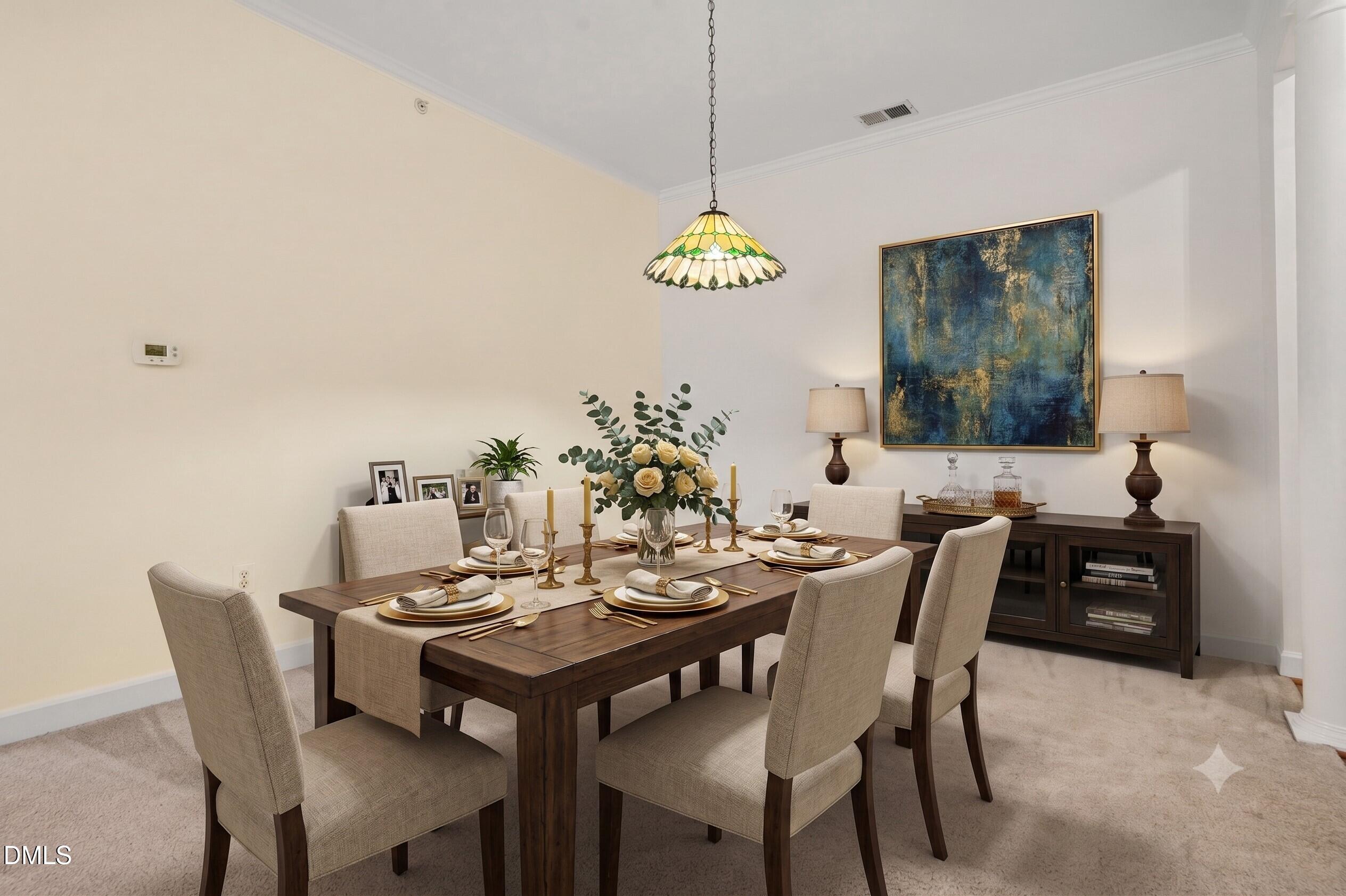 2651 Mellowfield Drive, Unit 203 Raleigh, NC 27604 - Photo 8 of 32 a view of a dining room with a table and chairs
