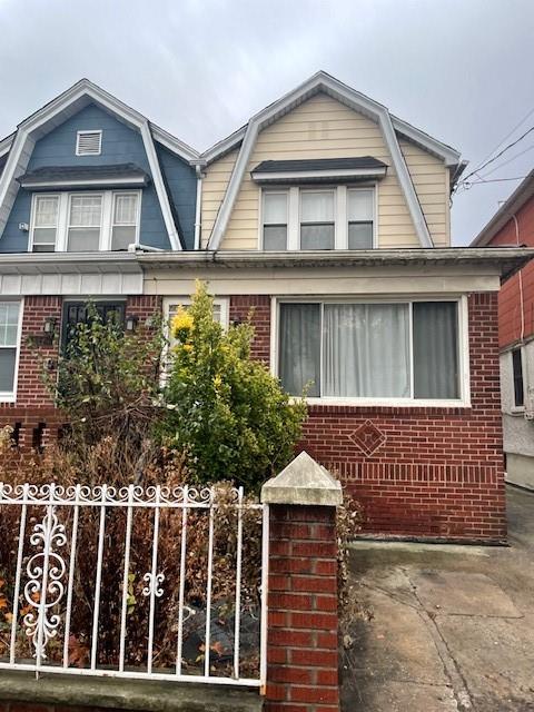 4510 Clarendon Road Brooklyn, NY 11203 - Photo 7 of 8 a front view of a house with a garden