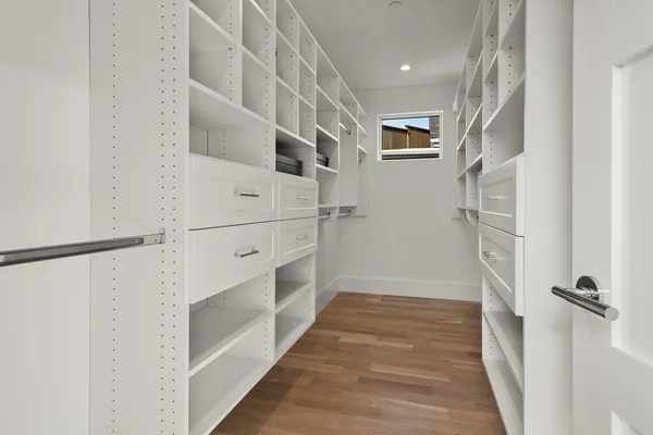 a view of a hallway with windows