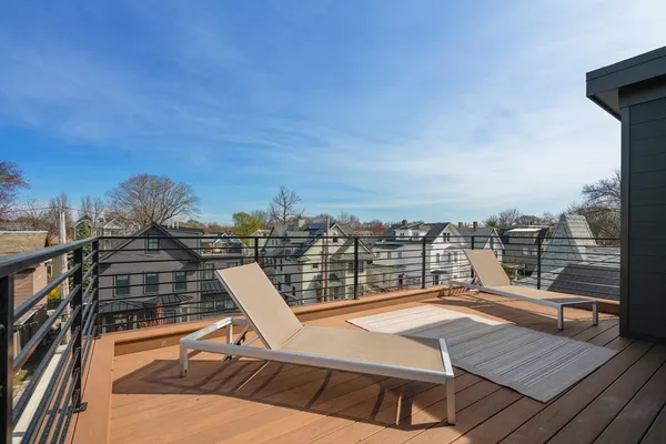a view of a balcony with city view