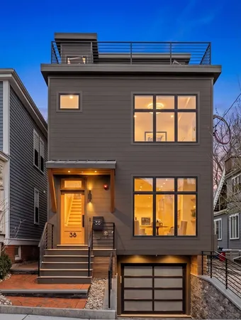 a view of front door of house with stairs