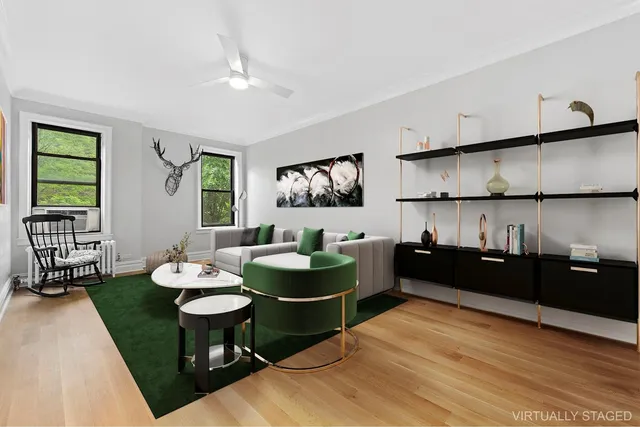 a living room with furniture and window