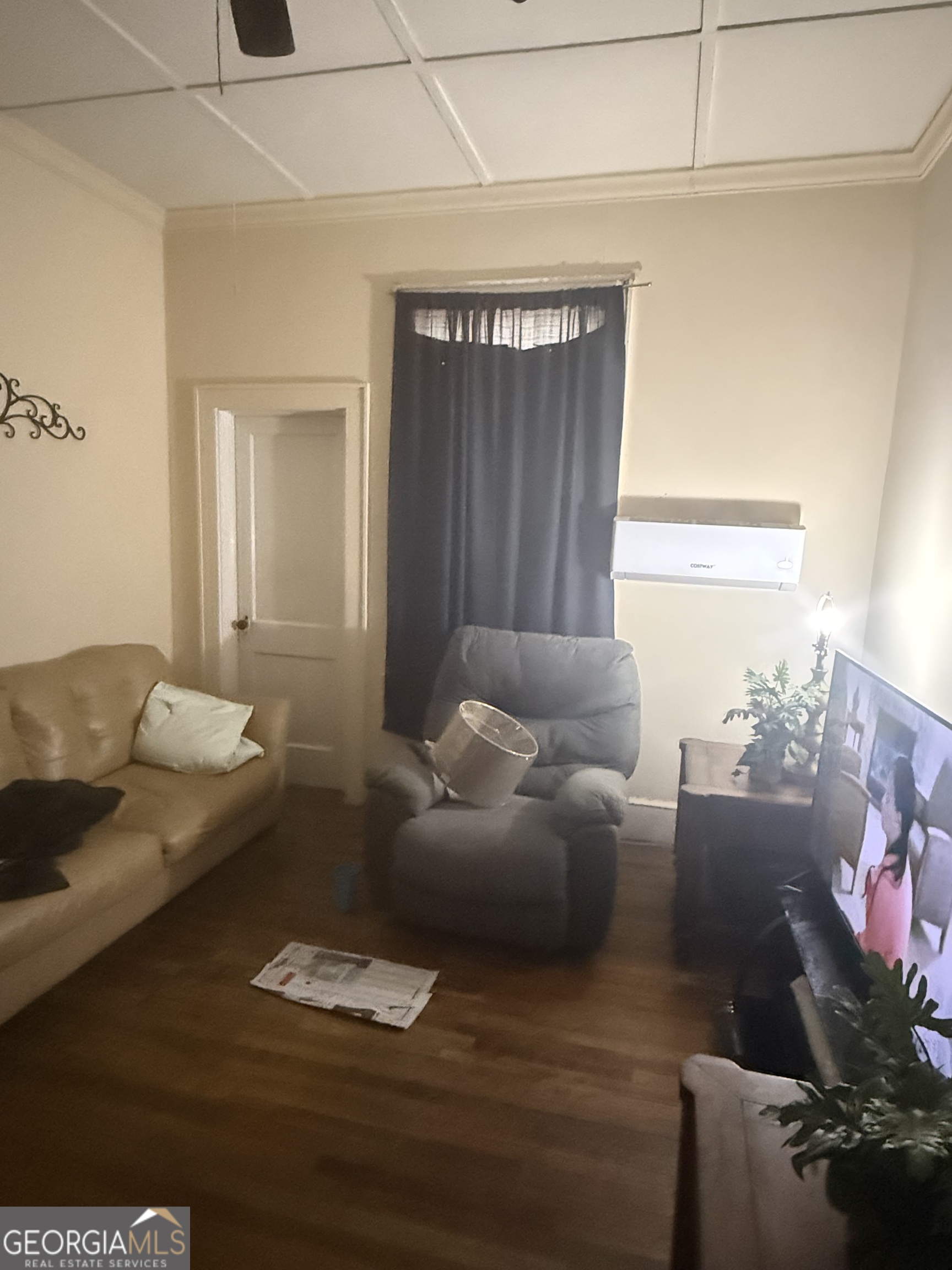 902 1st Street Lanett, AL 36863 - Photo 2 of 6 a living room with furniture and a potted plant