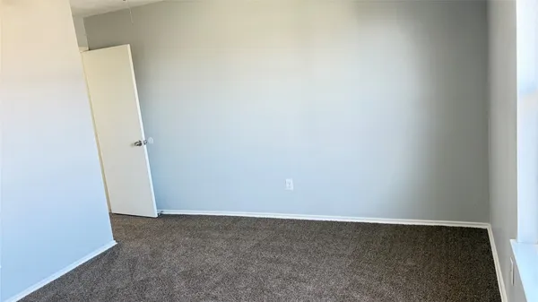 a view of a small space with a fan