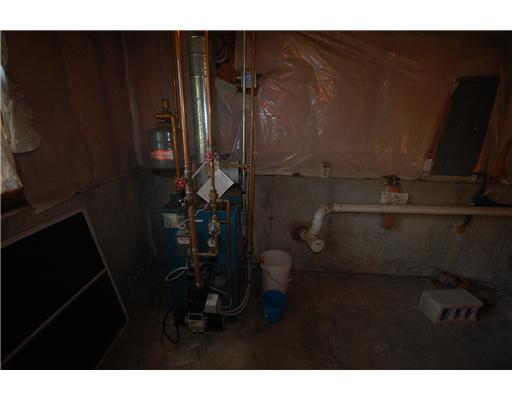 68 Tomaquag Road Hopkinton, RI 02808 - Photo 10 of 12 Cellar or Basement. Oil Fired Baseboard Heat