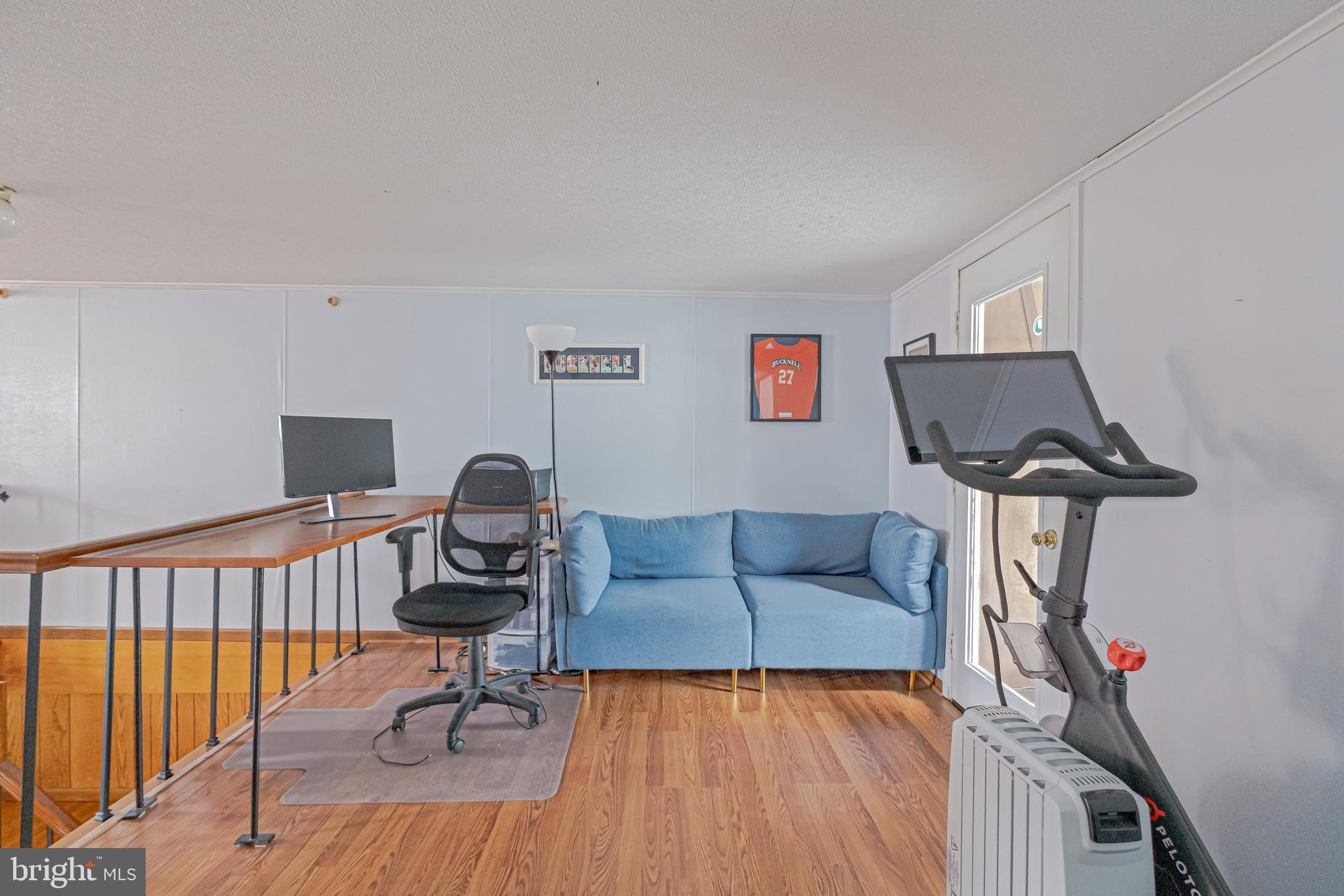 1701 Pine Street Philadelphia, PA 19103 - Photo 13 of 16 a living room with furniture and a wooden floor