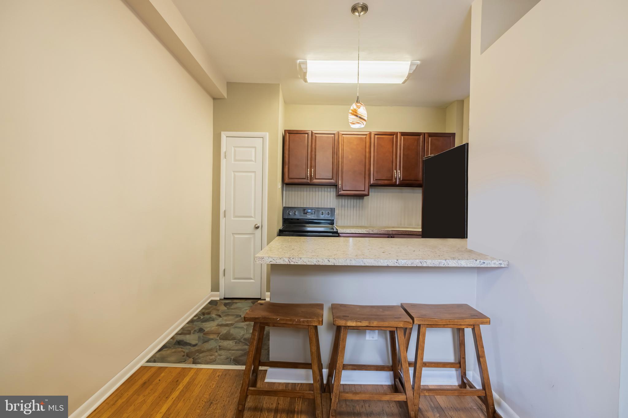 1701 Pine Street Philadelphia, PA 19103 - Photo 3 of 16 a view of dining room with furniture and wooden floor