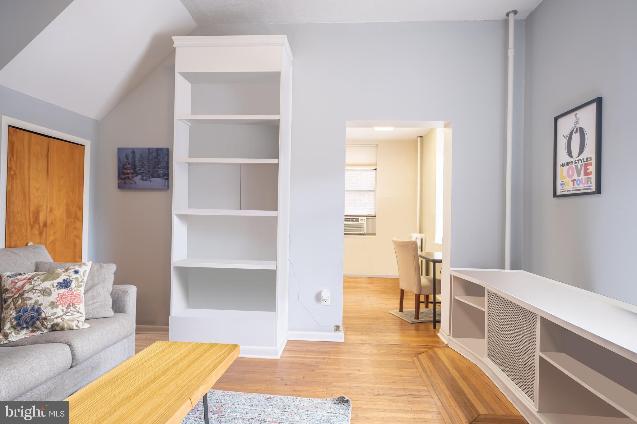 1701 Pine Street Philadelphia, PA 19103 - Photo 4 of 16 a room with a bed and a wooden floor