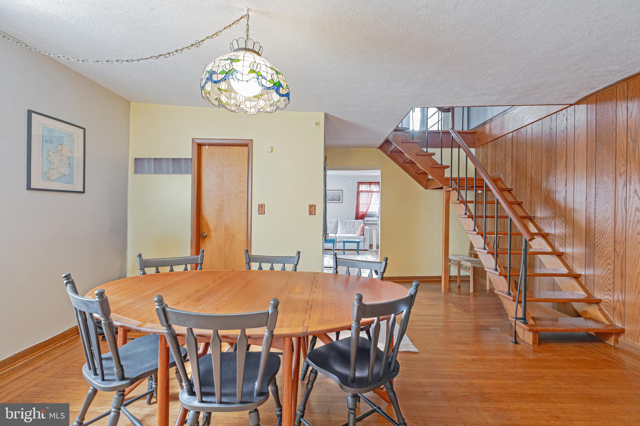1701 Pine Street Philadelphia, PA 19103 - Photo 7 of 16 a view of a dining room with furniture and wooden floor