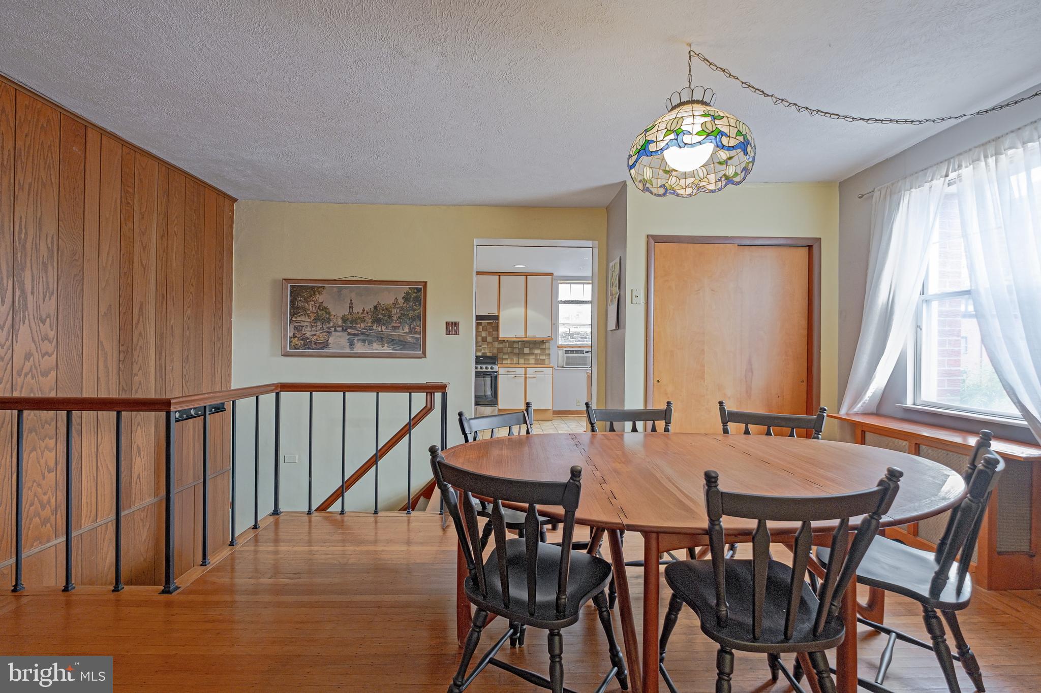 1701 Pine Street Philadelphia, PA 19103 - Photo 10 of 16 a view of a dining room with furniture window and wooden floor