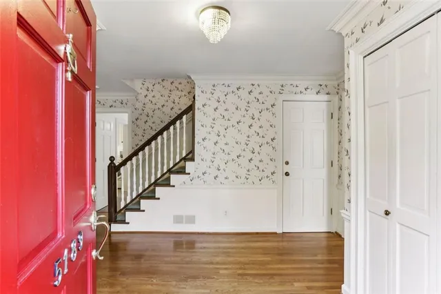 a view of entryway with wooden floor