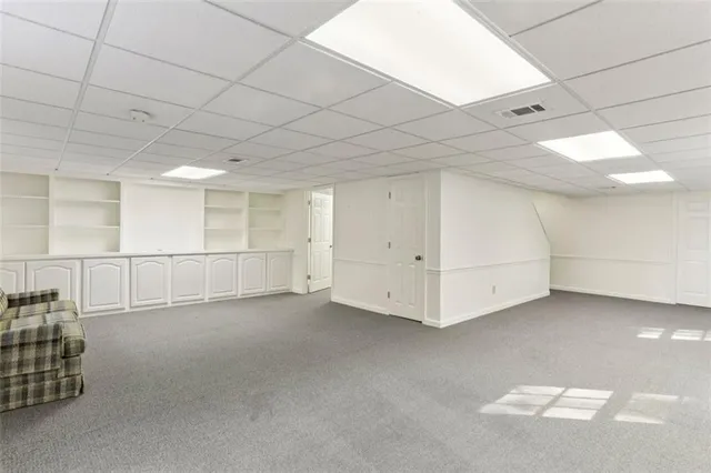a view of livingroom with furniture and windows