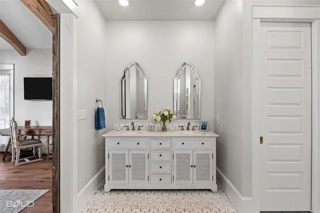 a view of a balcony with wooden floor and lake view