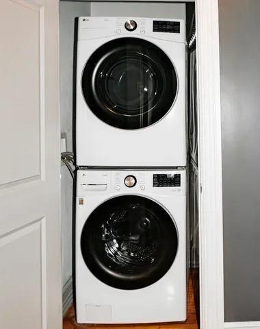 a view of gallery with wooden floor