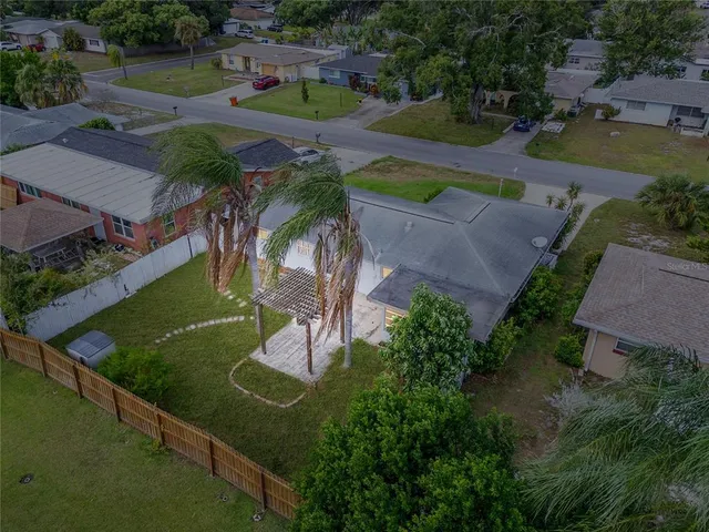 a view of a street with a garden