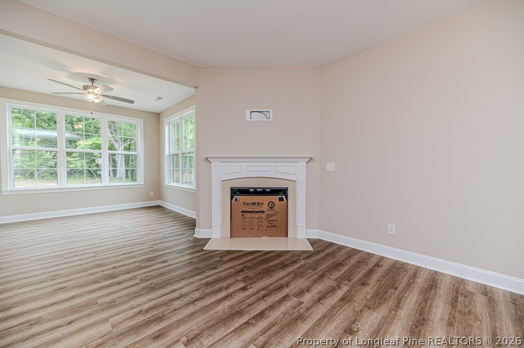 261 River Falls Road Sanford, NC 27332 - Photo 4 of 28 Large Great Room with gas log fireplace