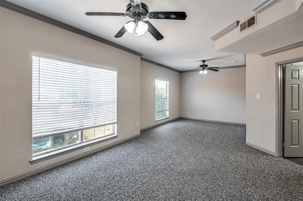 2524 Preston Road, Unit 1404 Plano, TX 75093 - Photo 9 of 15 a view of an empty room with a window