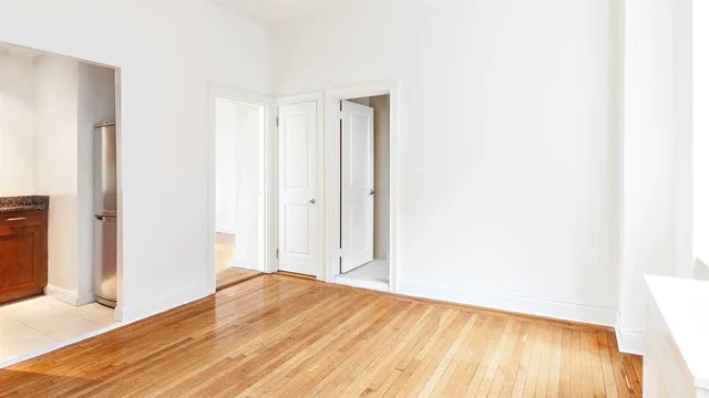 a bathroom with a tub sink and vanity