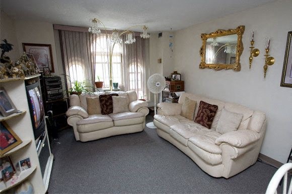 144 Cabot Street Chicopee, MA 01013 - Photo 13 of 15 a living room with furniture and a large window