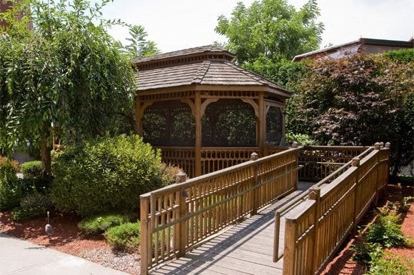 144 Cabot Street Chicopee, MA 01013 - Photo 4 of 15 a view of balcony with small garden