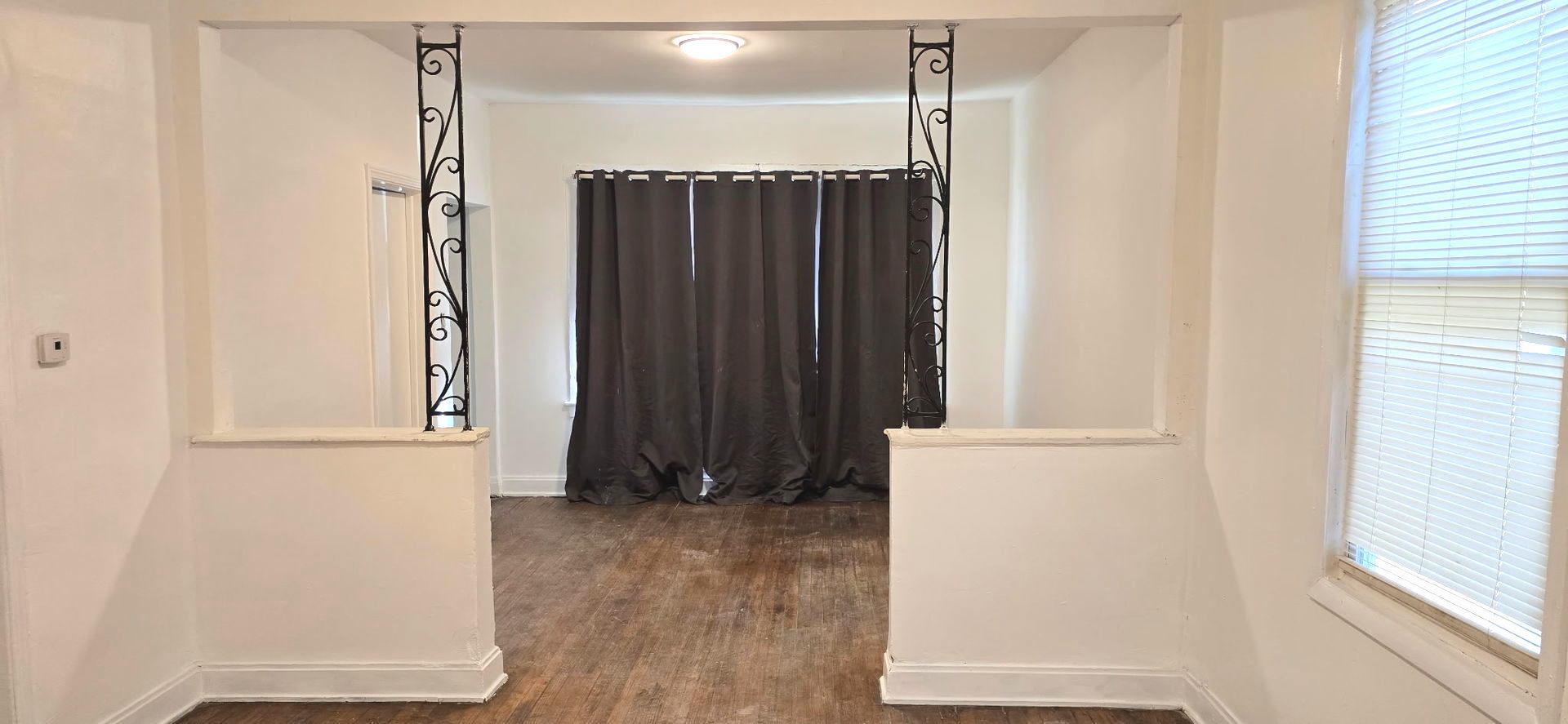 2046 West 69th Place Chicago, IL 60636 - Photo 6 of 12 an entryway with wooden floor door and bedroom