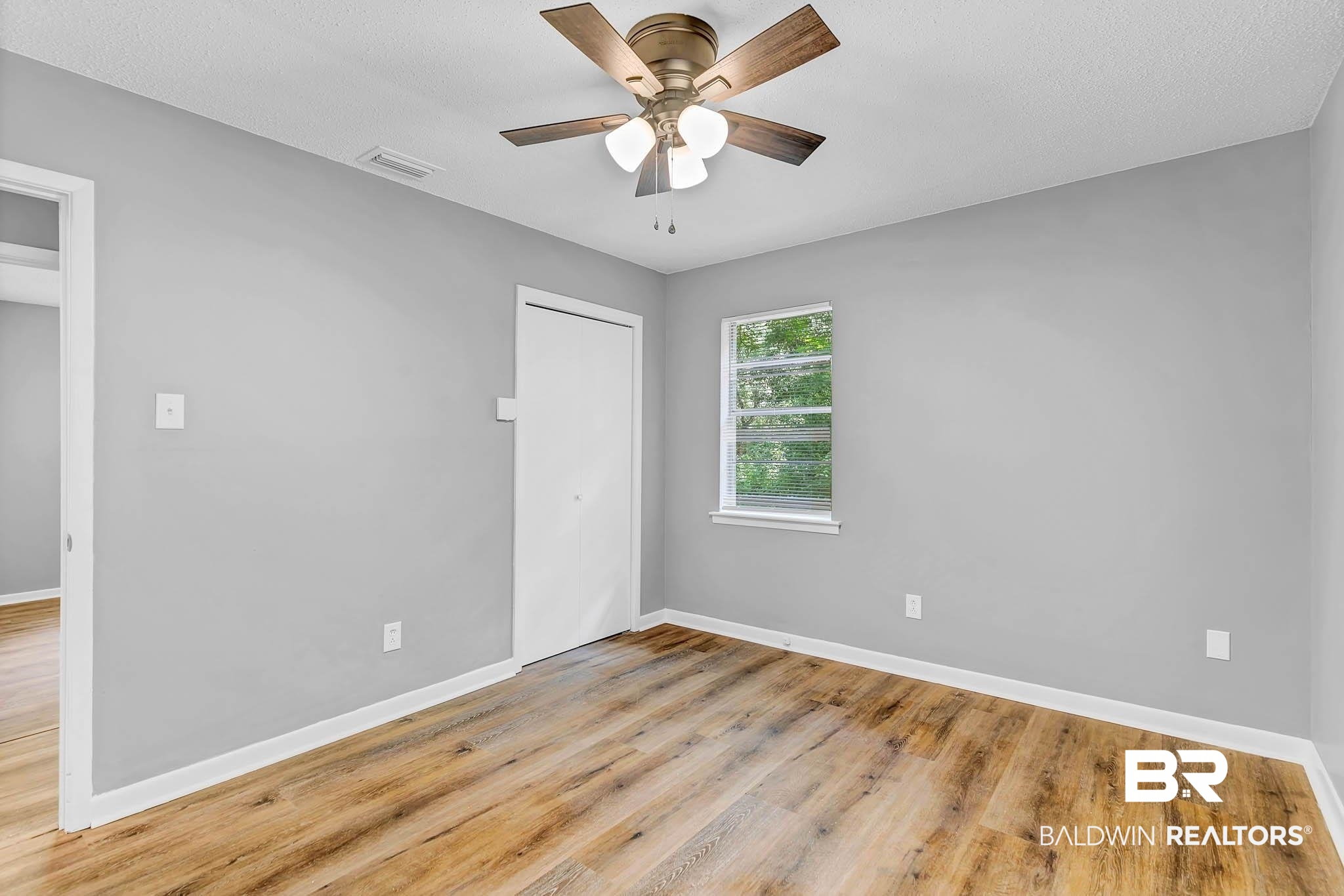 3304 Armond Drive Mobile, AL 36605 - Photo 27 of 62 Empty room featuring ceiling fan and light wood-type flooring