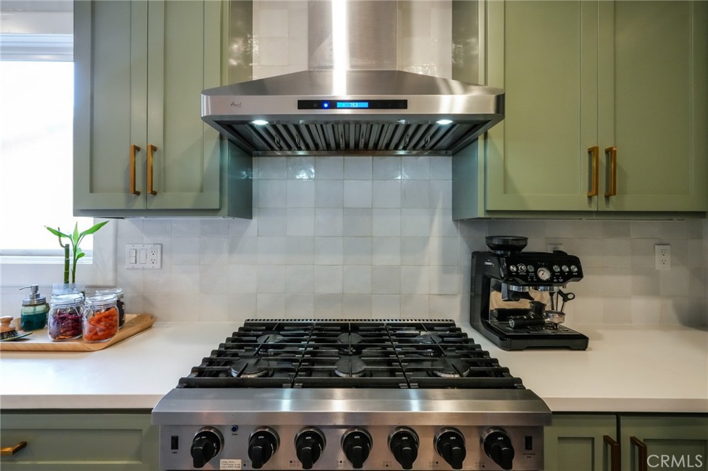 3958 Seneca Avenue Los Angeles, CA 90039 - Photo 14 of 48 a kitchen with a stove and a cabinets