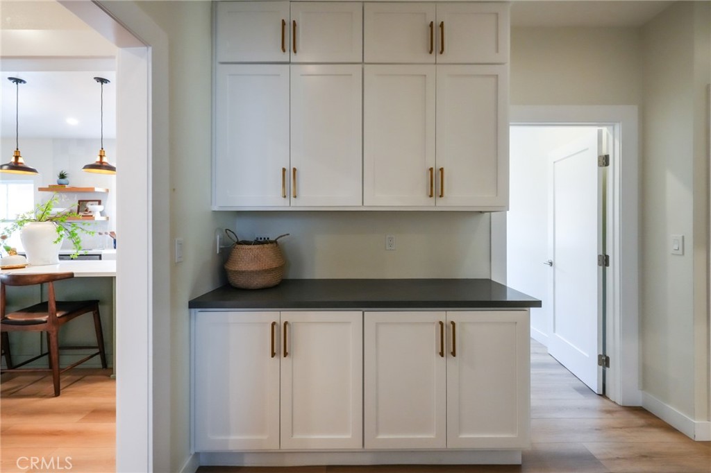 3958 Seneca Avenue Los Angeles, CA 90039 - Photo 30 of 48 a kitchen with white cabinets and sink