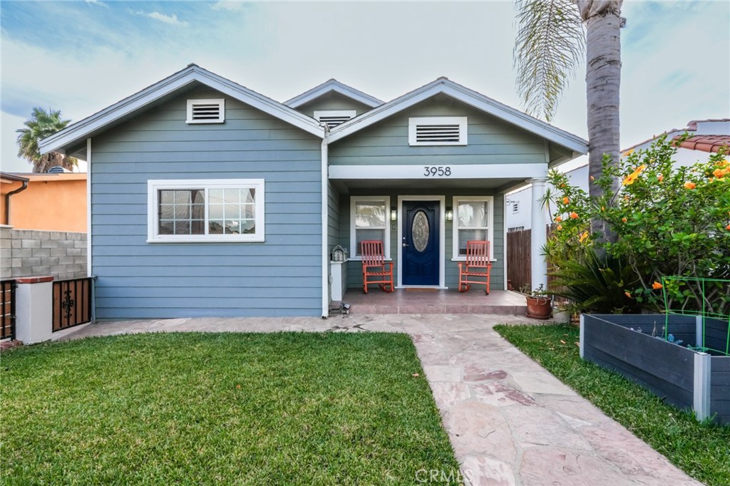 3958 Seneca Avenue Los Angeles, CA 90039 - Photo 3 of 48 a front view of a house with a yard and porch
