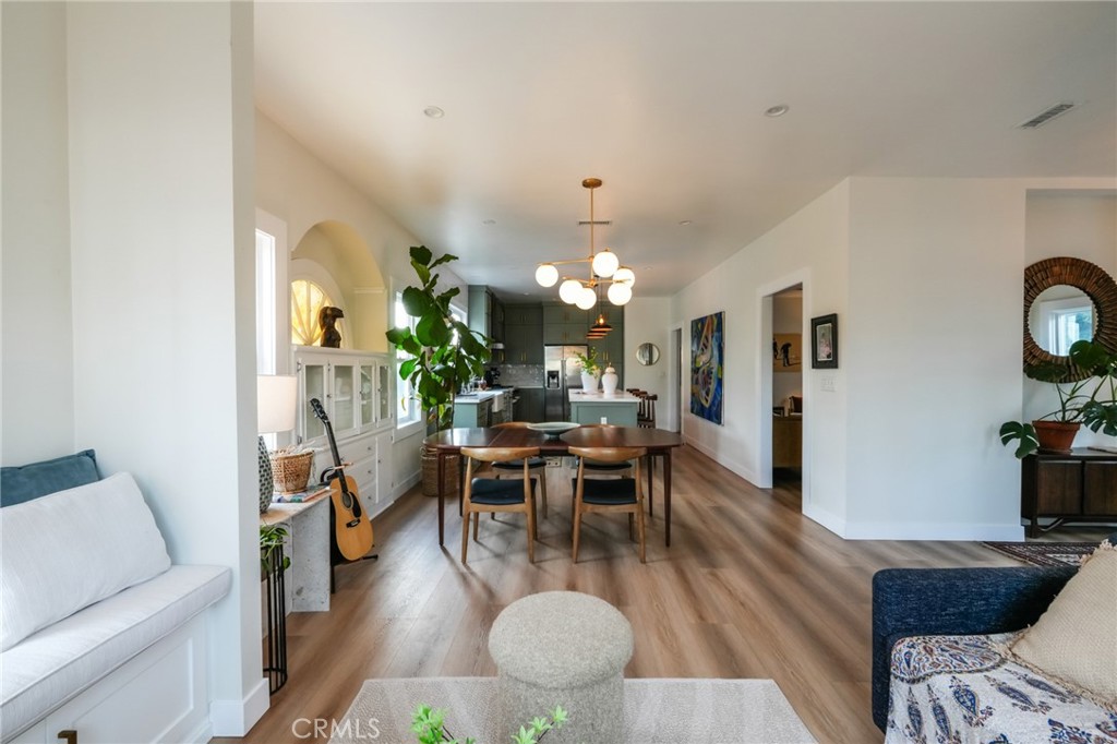 3958 Seneca Avenue Los Angeles, CA 90039 - Photo 7 of 48 a view of a dining room with furniture and wooden floor