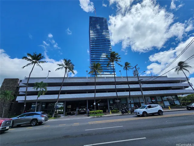 a view of a cars parked in front of a building