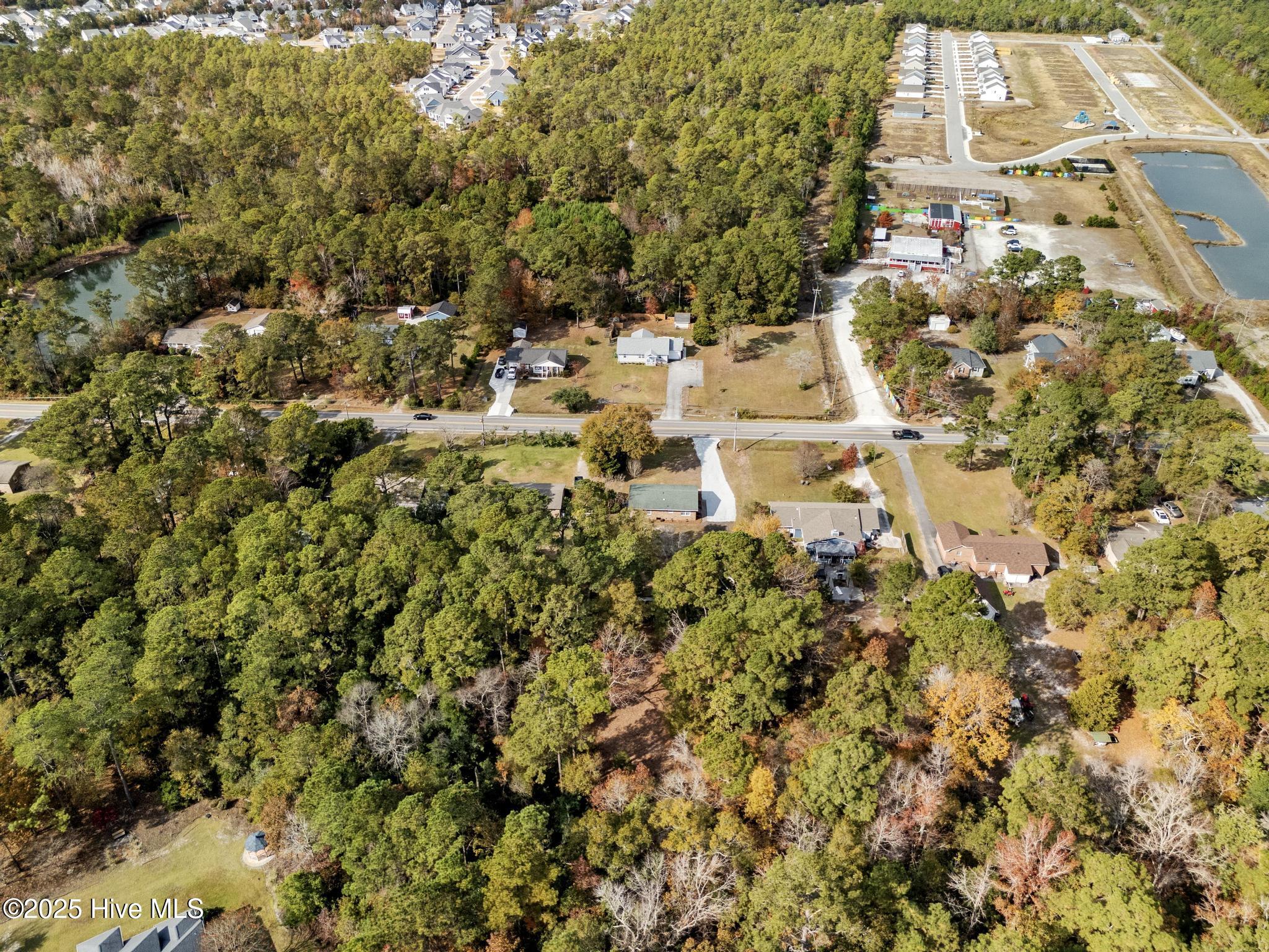 1462 Country Club Drive Hampstead, NC 28443 - Photo 38 of 44 DJI_20251119120027_0211_D